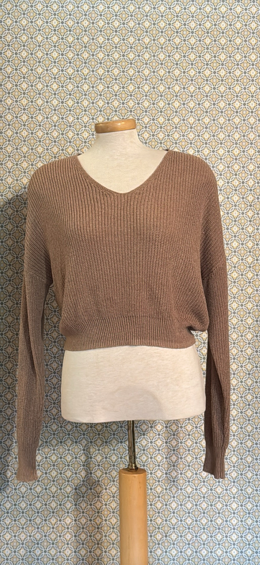 A C'est Moi ribbed knit long-sleeve V-neck sweater in a warm taupe-brown color 