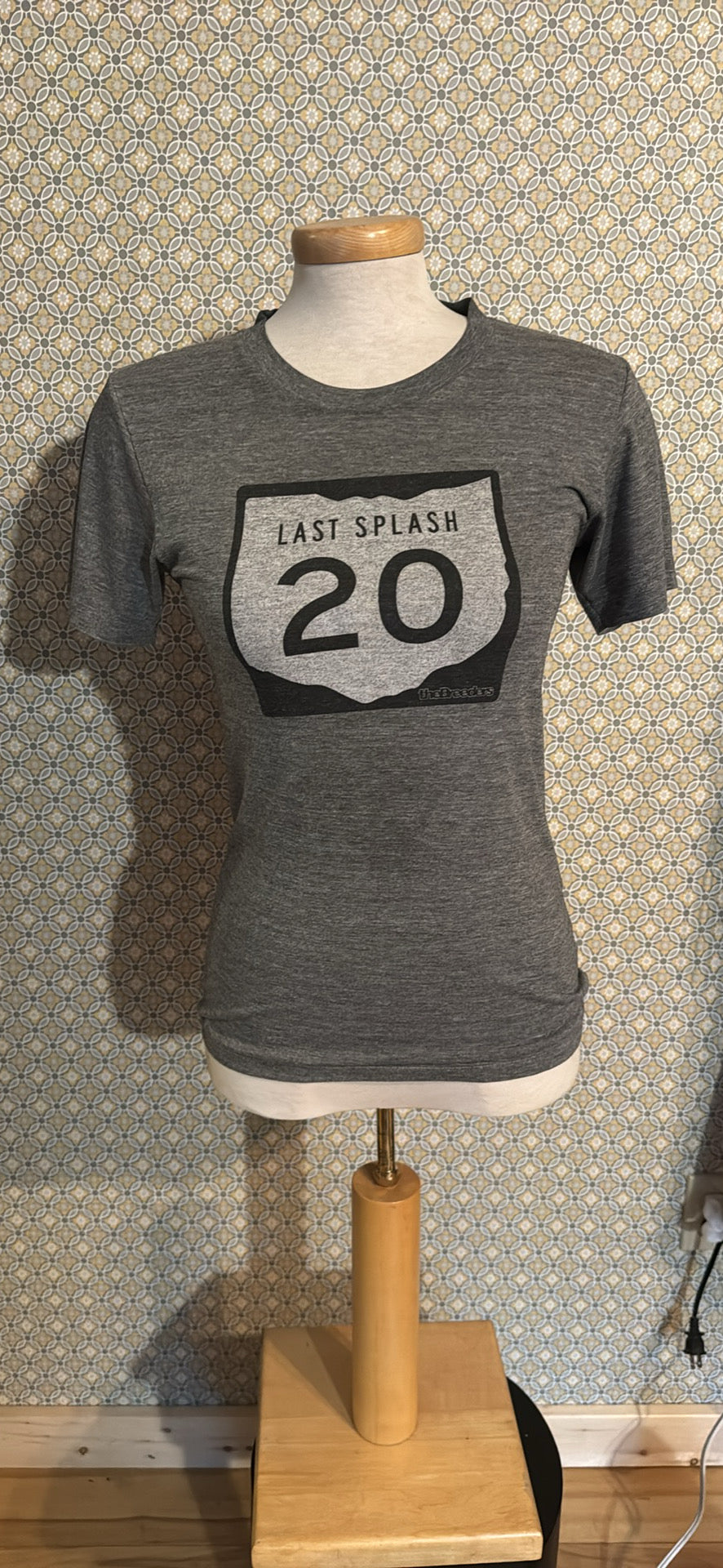 The Breeders heather gray short-sleeve t-shirt . The shirt features a black and white graphic shield design with the text 'LAST SPLASH 20'.