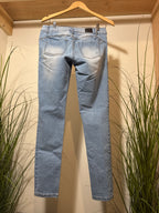 Blue notes, curvy skinny, low rise jeans.