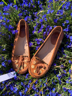 Moccasin style flats with foot print sole