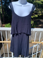 Sleeveless navy blue dress with flowy skirted bust by Maeve