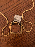 Chico’s mixed-metal "Generations of Love" folding book/locket pendant necklace.
