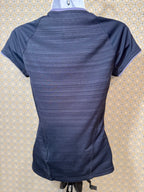 Back view of Navy blue, short sleeve, v-neck Adidas active wear women's fit top in extra small for sale by consignment.  