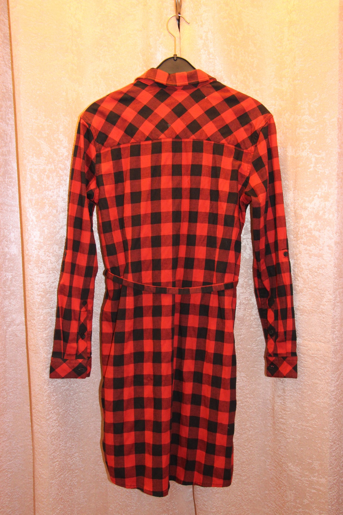 Back view of a red and black buffalo plaid long-sleeve cotton blend shirt dress for sale on consignment.