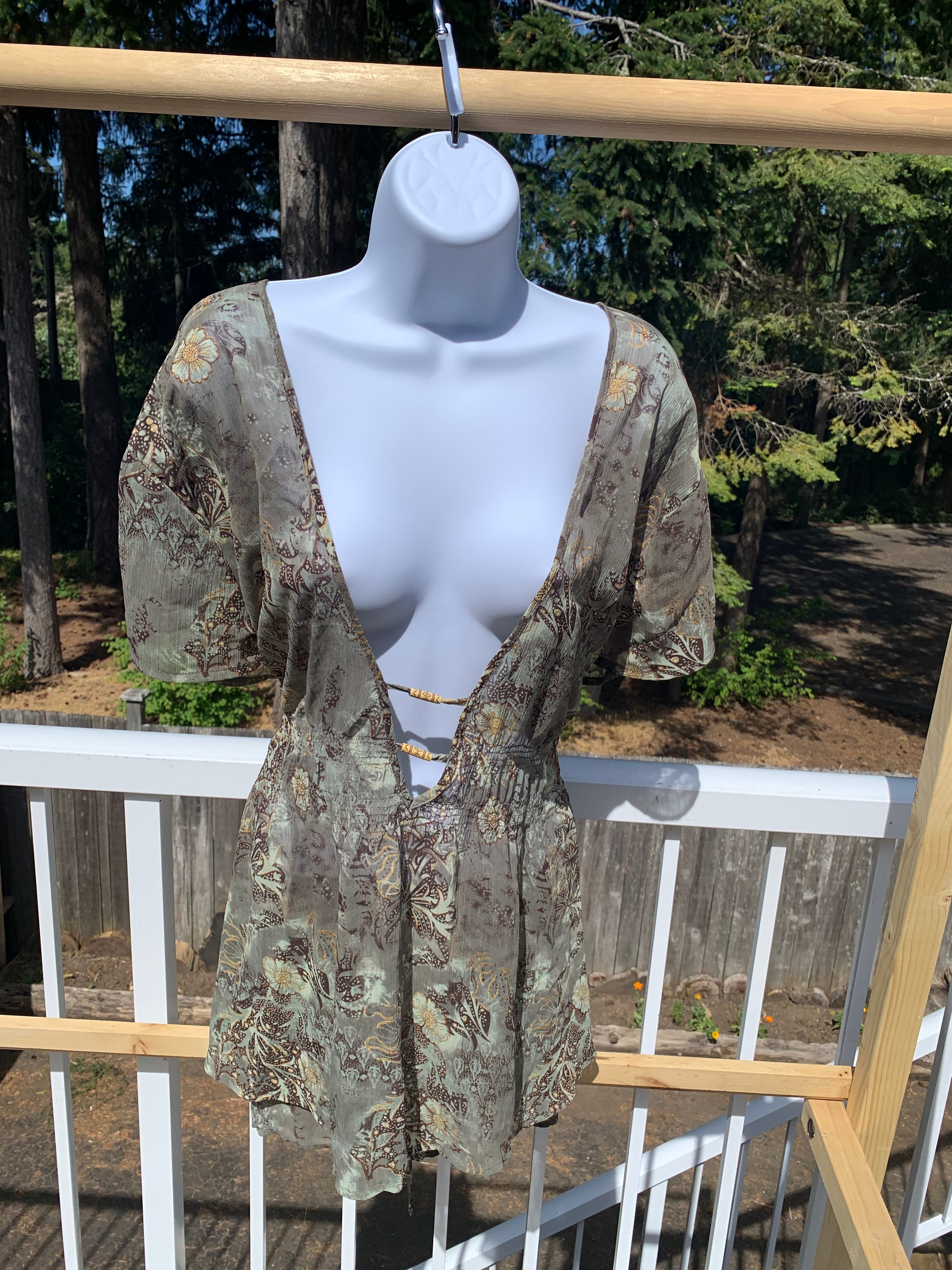 Pennington’s short sleeve sheer blouse
