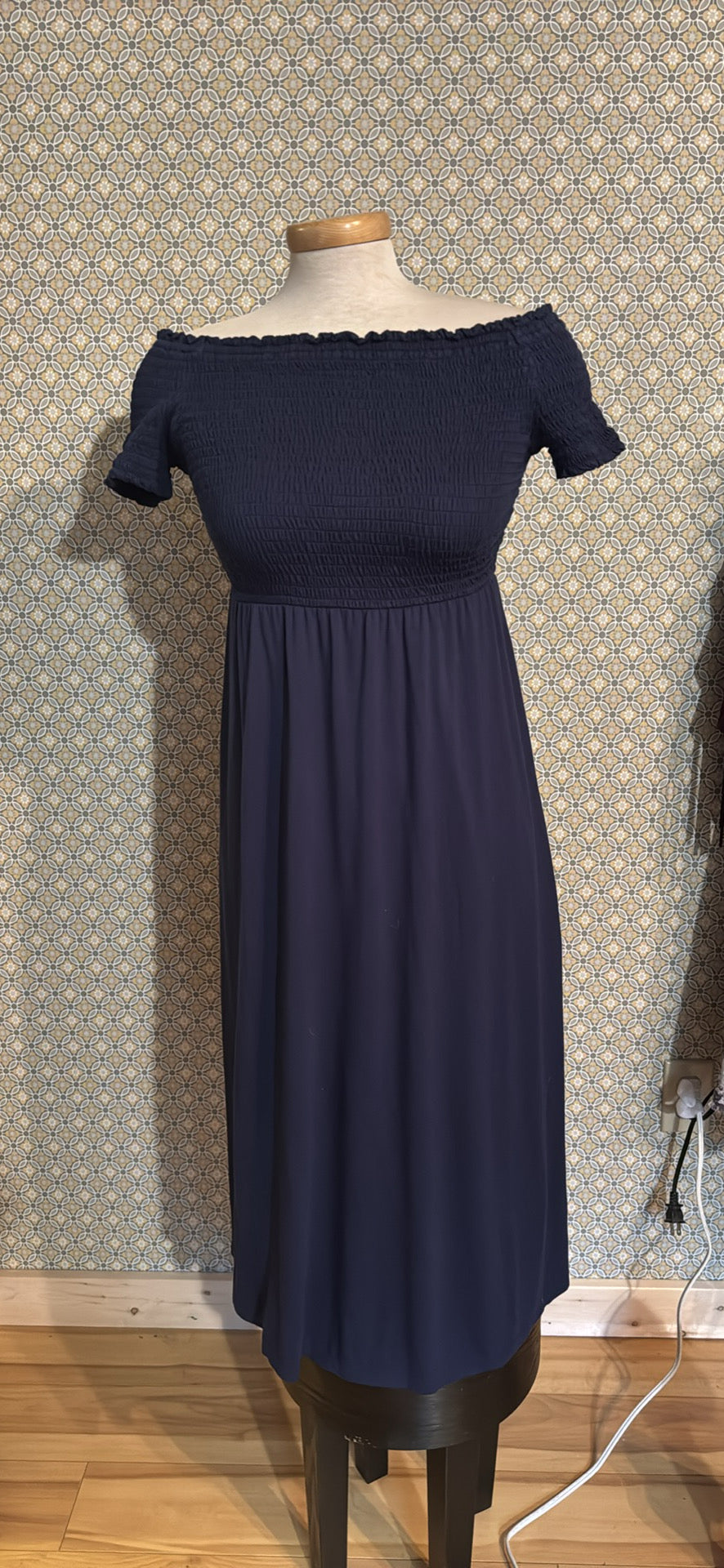 A navy blue off-the-shoulder midi dress 