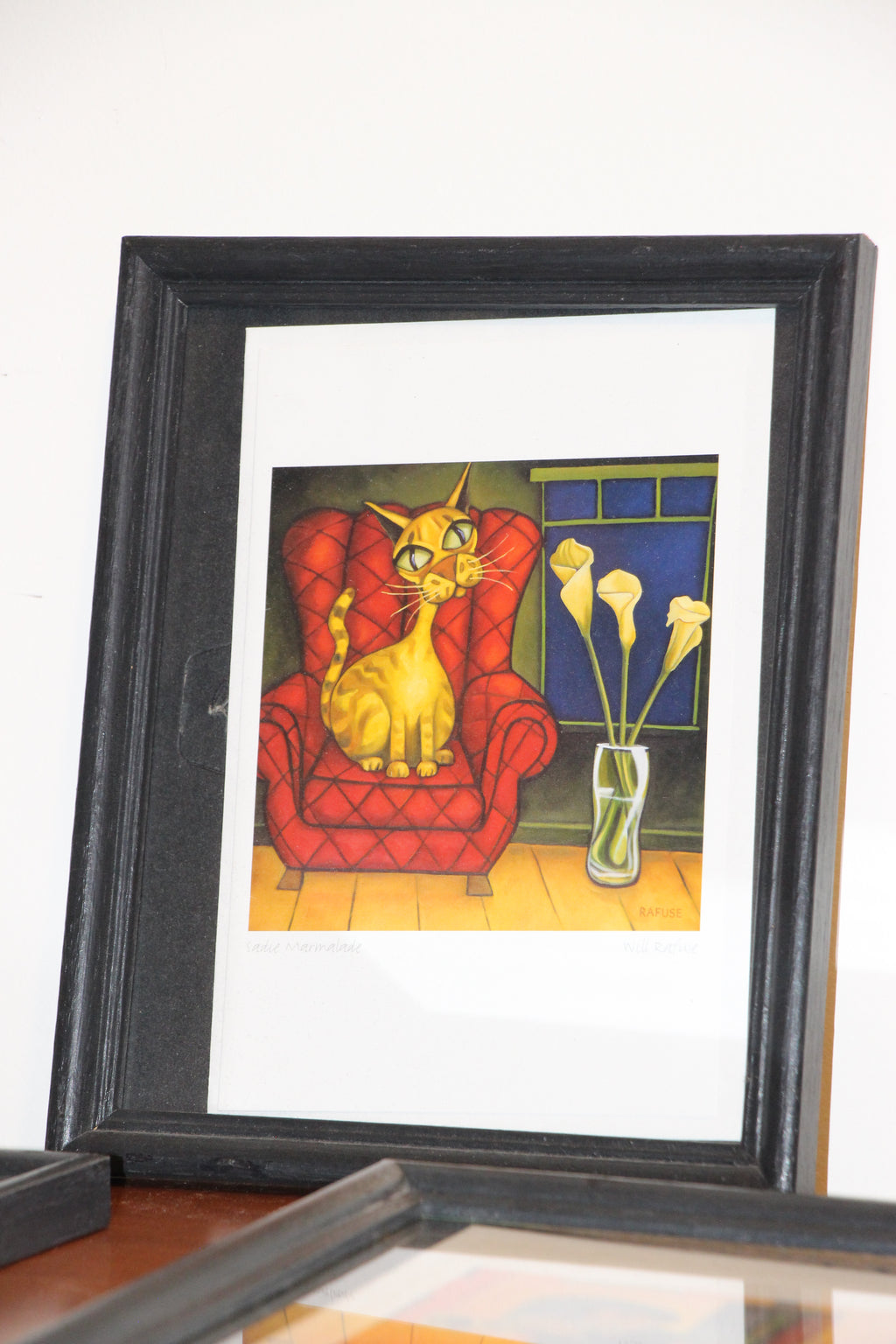 3 Will Rafuse prints in black wood frames