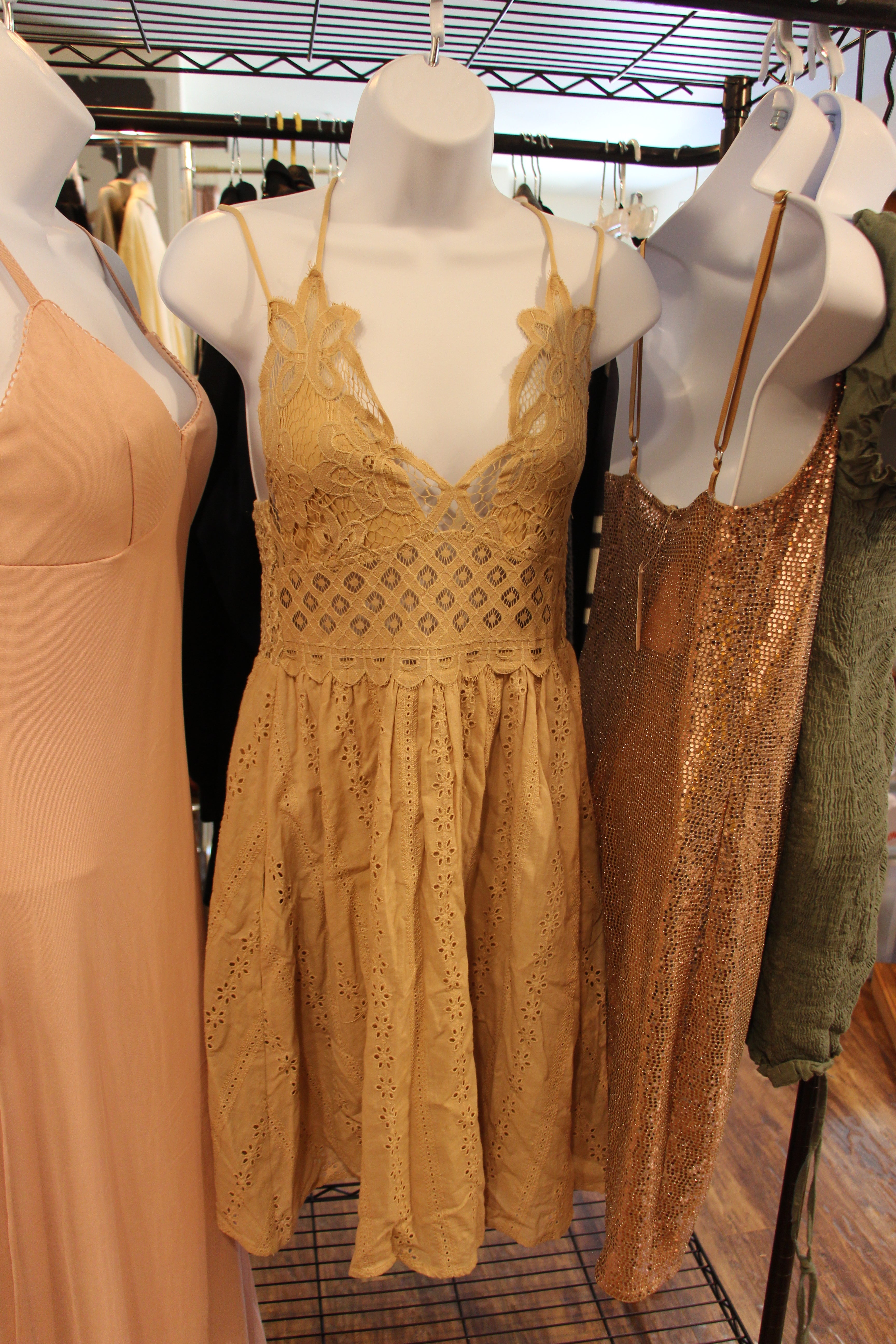 Light beige deep plunge strappy dress with gathered skirt