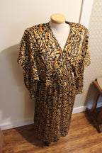Size 6 Vintage 80's tiger print belted dress with pleated skirt by P.M. Par Randy Pantel