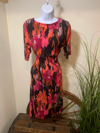 Abstract Floral Dress- elbow length sleeves- buttoned collar cut out - gathered bust line and side waist. ￼