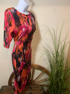 Abstract Floral Dress- elbow length sleeves- buttoned collar cut out - gathered bust line and side waist. ￼