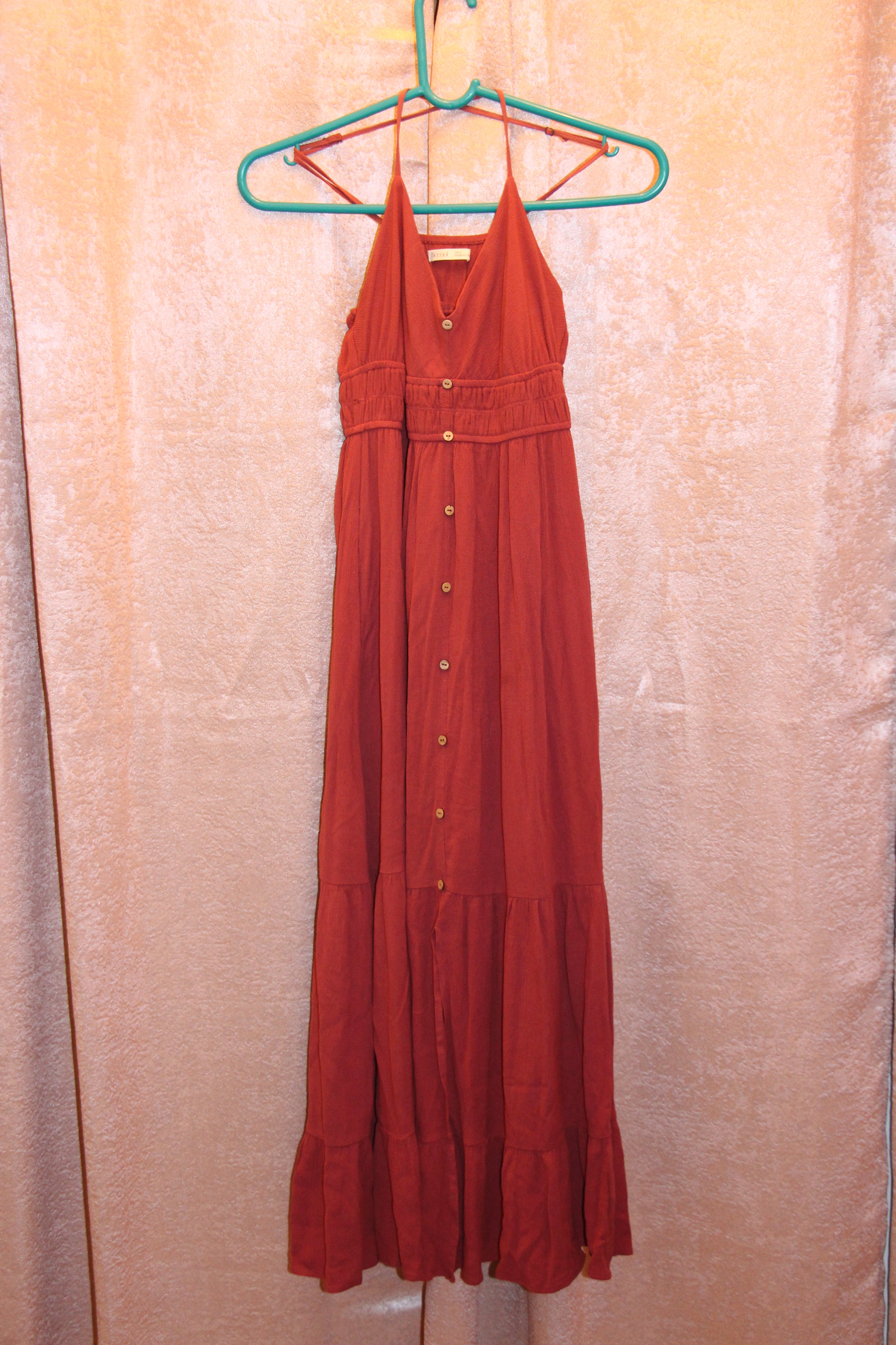 A consignment boutique Size S Be Cool 100% Rayon Adjustable Spaghetti Strap Button Up Front dusty plum coloured sleeveless maxi dress with a tiered skirt and front button-up.