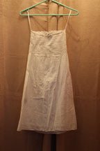A consignment boutique white sleeveless spaghetti-strap dress with a smocked bodice and gathered skirt, Size S Seduction Fashion White 100% Cotton Strapless Top Mini Dress