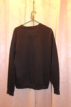 A black crewneck sweatshirt by Calvin Klein  (Women's Medium) on consignment