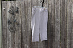 A pair of light gray striped cropped pants  by Haggar- Vertical Striped Cotton Pants Size 12