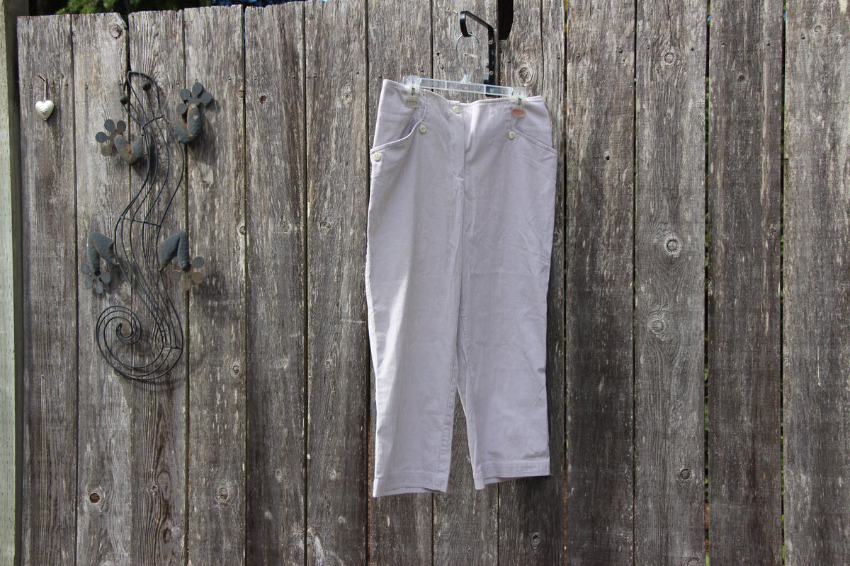 A pair of light gray striped cropped pants  by Haggar- Vertical Striped Cotton Pants Size 12