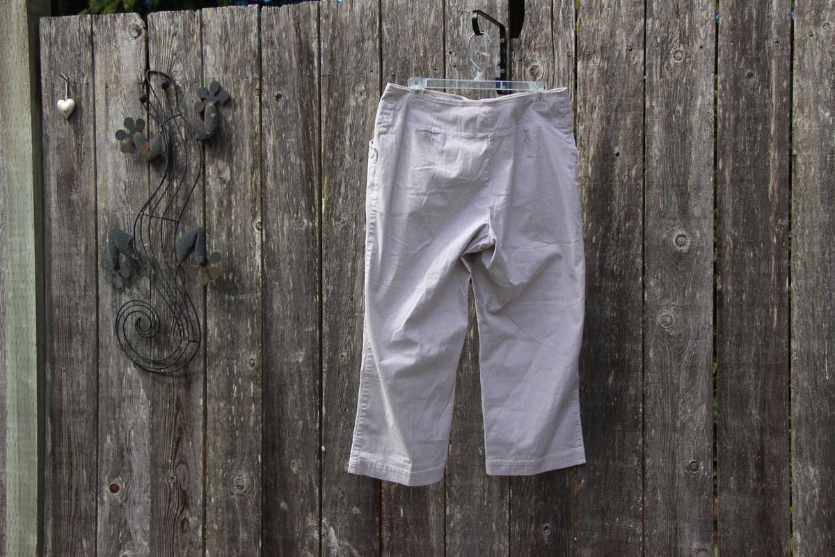 A pair of light gray striped cropped pants  by Haggar- Vertical Striped Cotton Pants Size 12