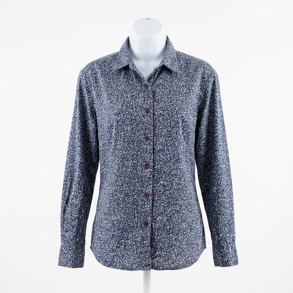 A long-sleeve button-up shirt with a dark blue and gray micro-pattern floral by Northern Reflections, on consignment. 