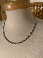 single-strand silver tone metal bead necklace, a Southwestern-inspired classic featuring smooth, high-polish spherical beads