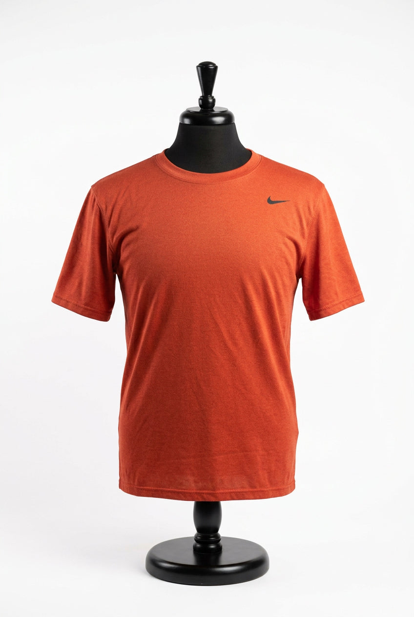 orange athletic shirt by Nike on consignment. 